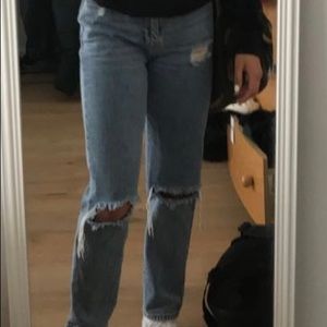 Medium wash ripped high rise mom jeans